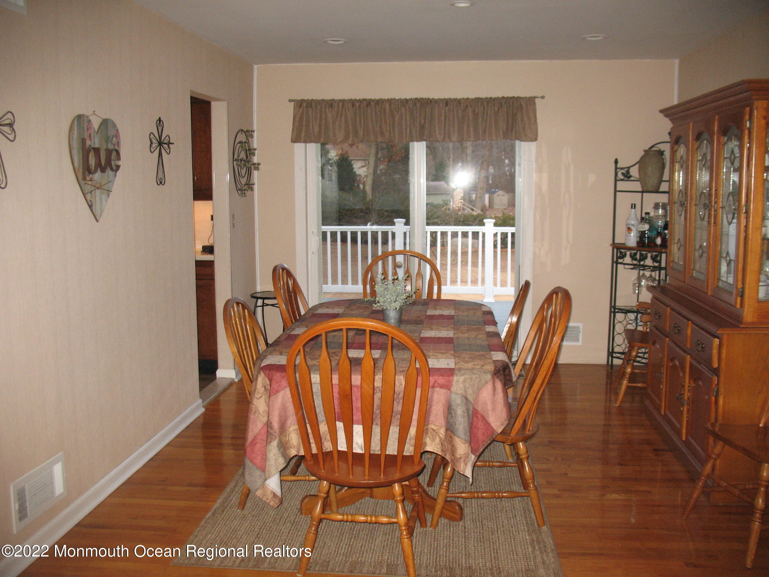 2 Godell Drive Howell, NJ 07731 - Photo 9 of 35 a view of a dining room with furniture and wooden floor