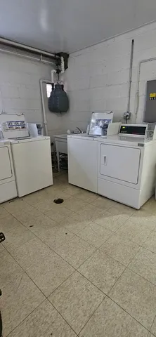 a storage room with washer and dryer