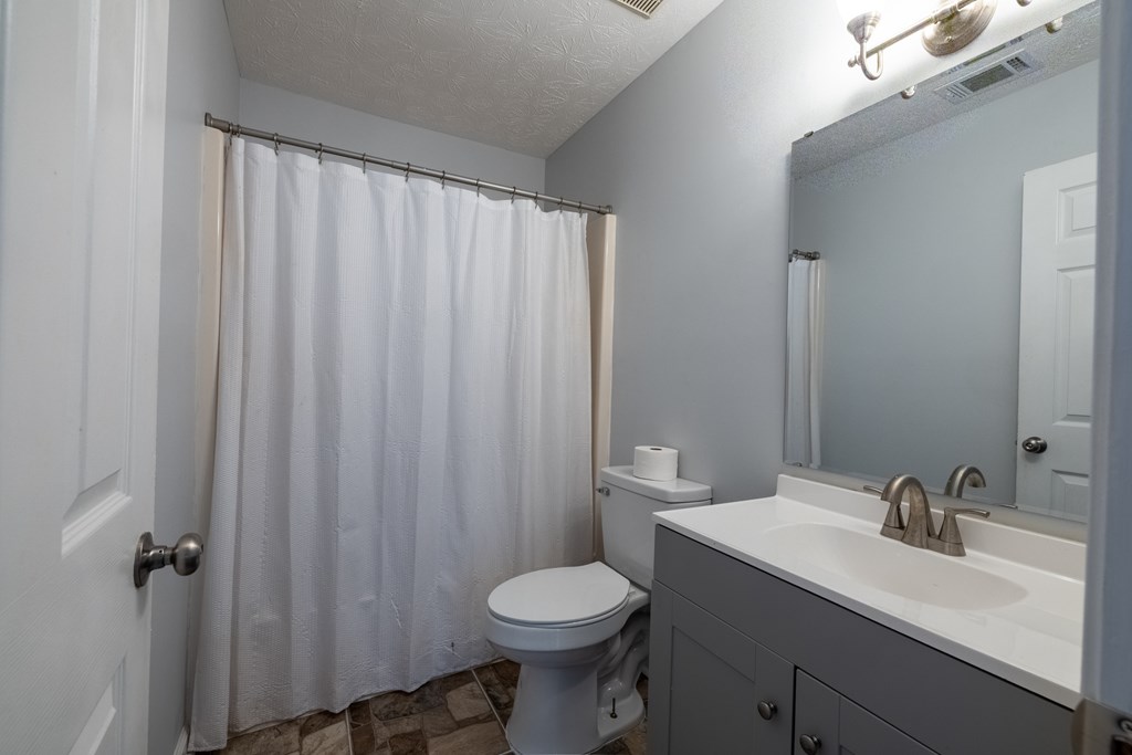 140 Maplebrook Court Columbus, GA 31904 - Photo 17 of 29 a bathroom with a sink a toilet and shower