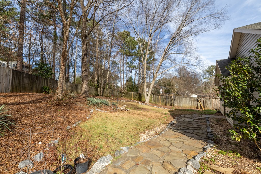 140 Maplebrook Court Columbus, GA 31904 - Photo 21 of 29 a view of a yard with trees