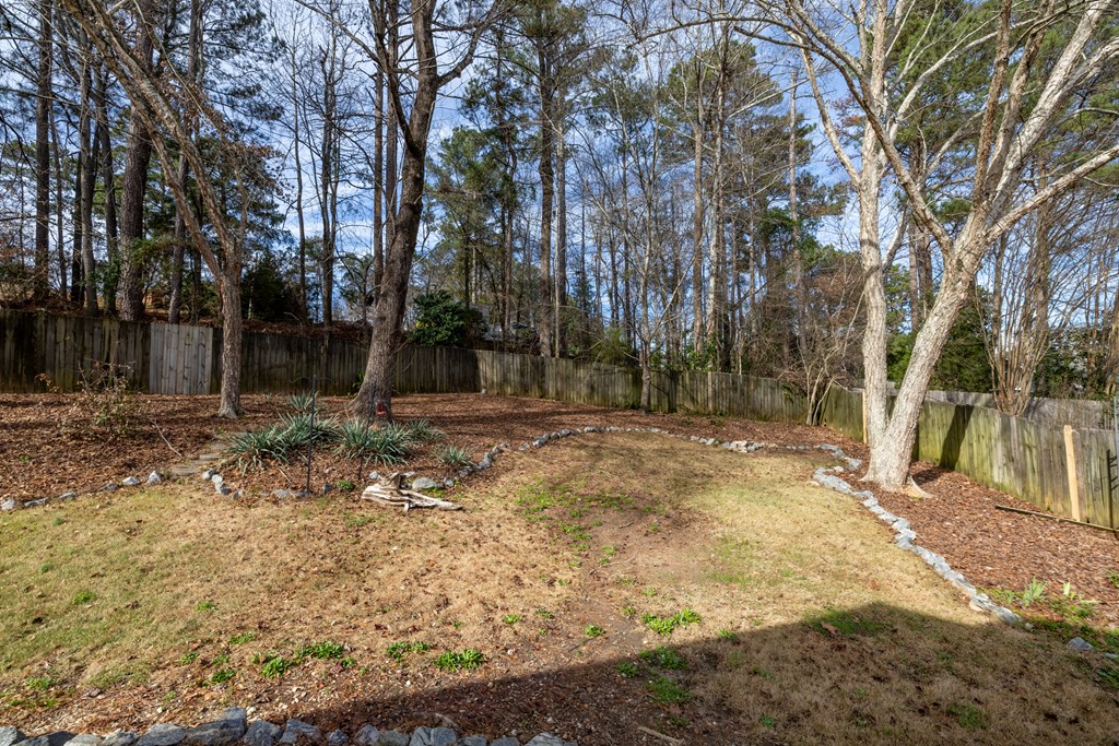 140 Maplebrook Court Columbus, GA 31904 - Photo 25 of 29 a view of backyard space with trees