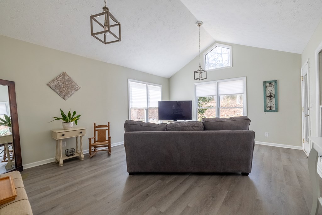 140 Maplebrook Court Columbus, GA 31904 - Photo 6 of 29 a living room with furniture and a wooden floor