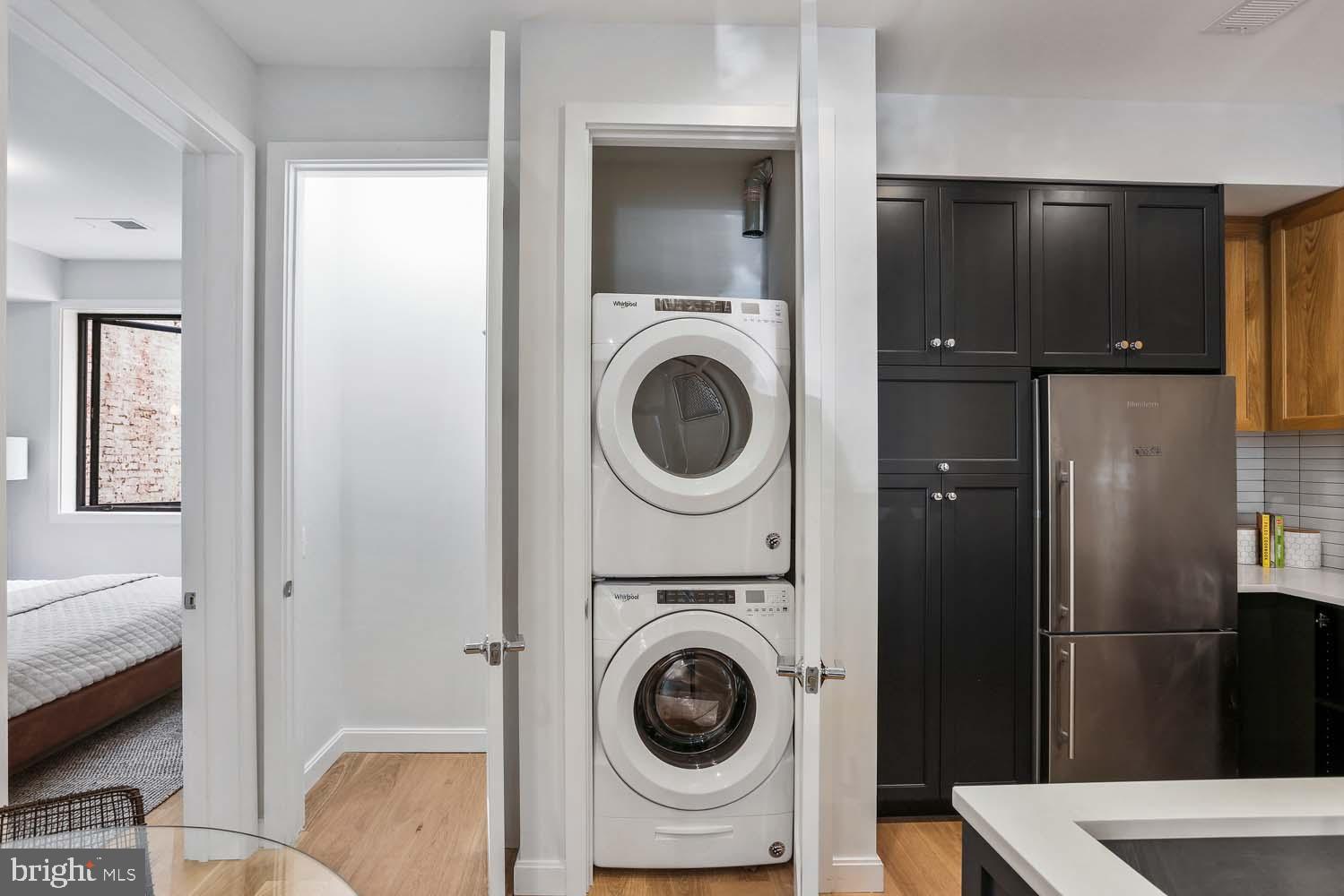 2248 Ontario Road Northwest, Unit 5 Washington, DC 20009 - Photo 11 of 30 a utility room with dryer and washer
