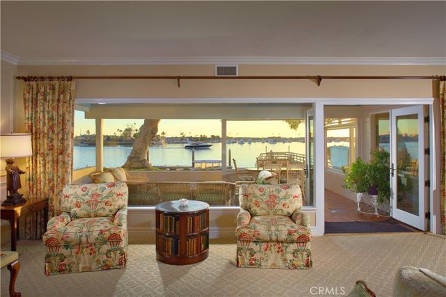 a room with a large window and table