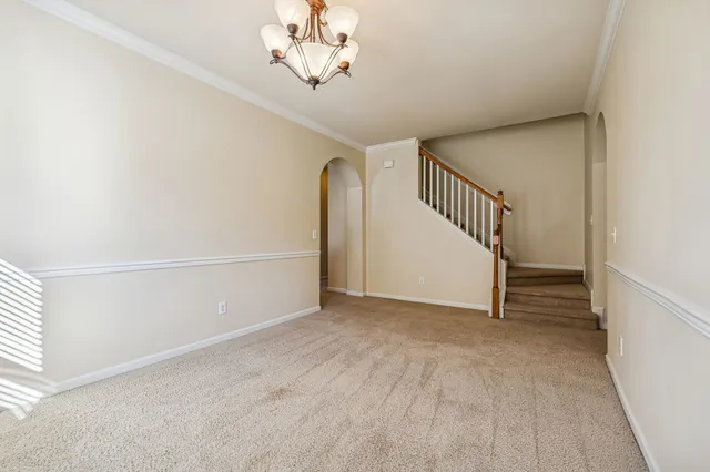 a view of a livingroom with a staircase