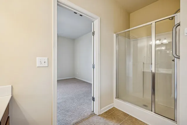 a bathroom with a sink a vanity and a mirror