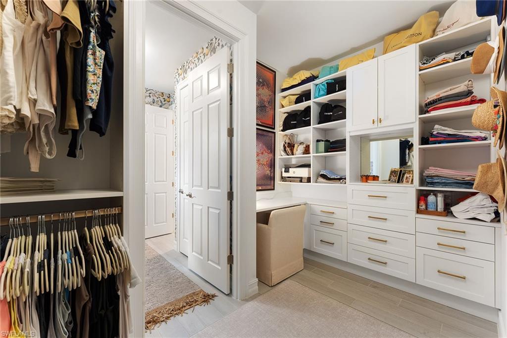 394 Deauville Loop Naples, FL 34114 - Photo 22 of 50 a view of walk in closet