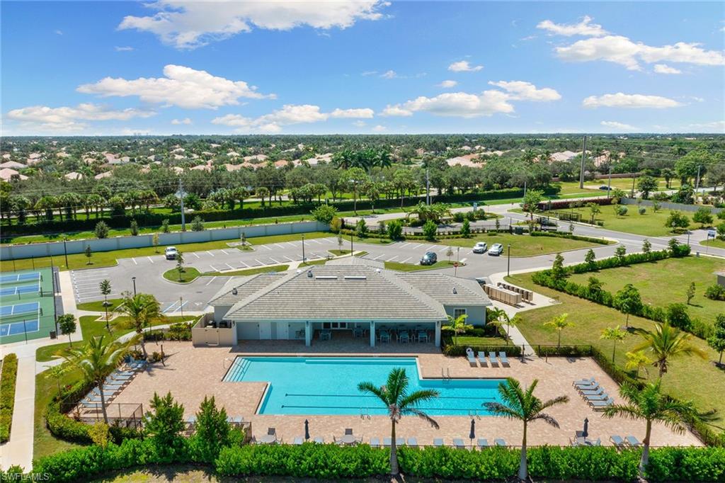 394 Deauville Loop Naples, FL 34114 - Photo 32 of 50 a view of a city with sitting space