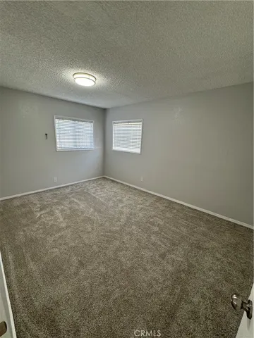 a kitchen with cabinets and appliances