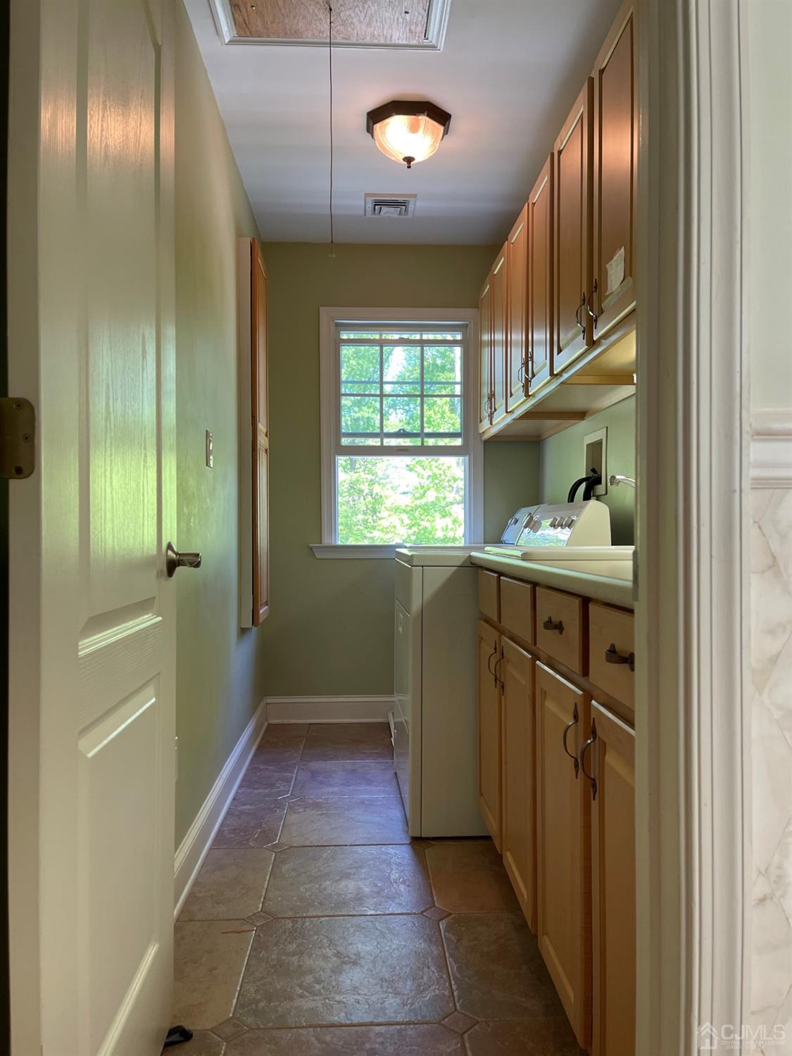 12 Ramsey Road Edison, NJ 08820 - Photo 25 of 30 a bathroom with a sink a vanity and a mirror