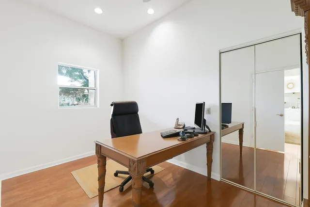 a view of a workspace with furniture