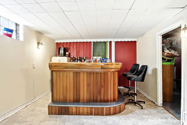 a room with furniture a desk and chair