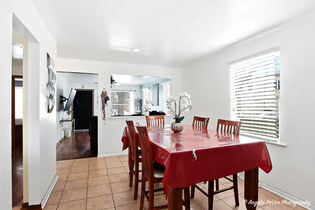 a view of a dining room with furniture