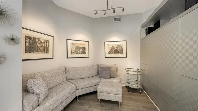 a bathroom with a sink a toilet and a shower