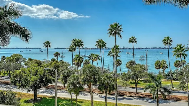 a view of swimming pool from a balcony