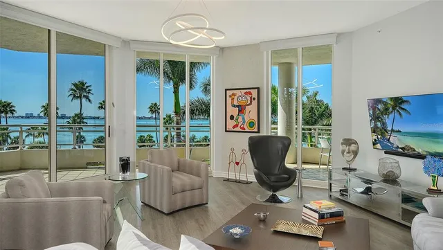 a view of balcony with two chairs and a table