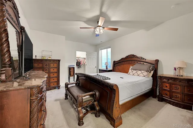 a bathroom with a granite countertop toilet sink and a bathtub