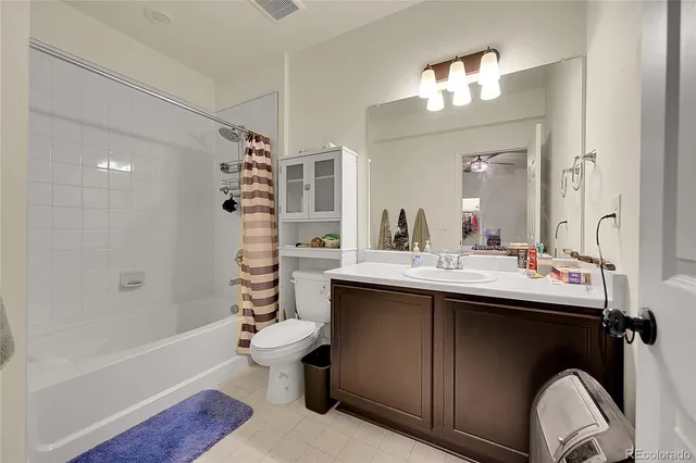 a view of a chairs and table in the balcony