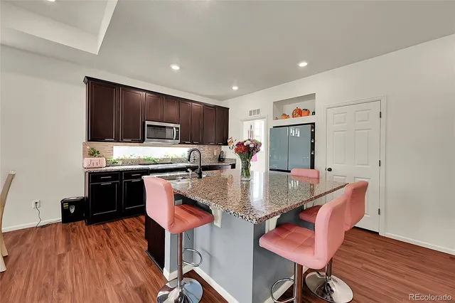 a utility room with closet dryer and washer