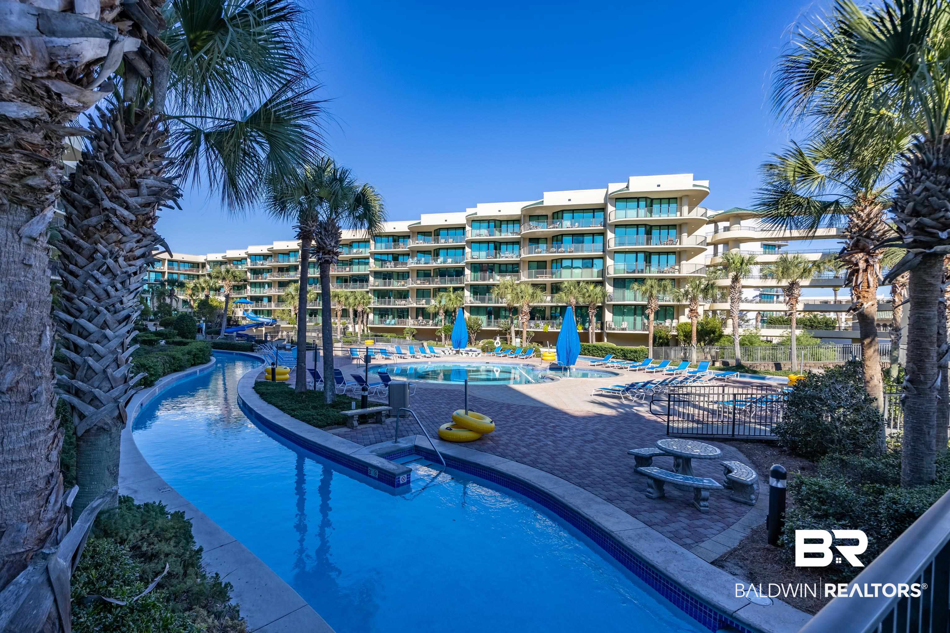 27580 Canal Road, Unit 1431 Orange Beach, AL 36561 - Photo 58 of 73 Community pool featuring a patio