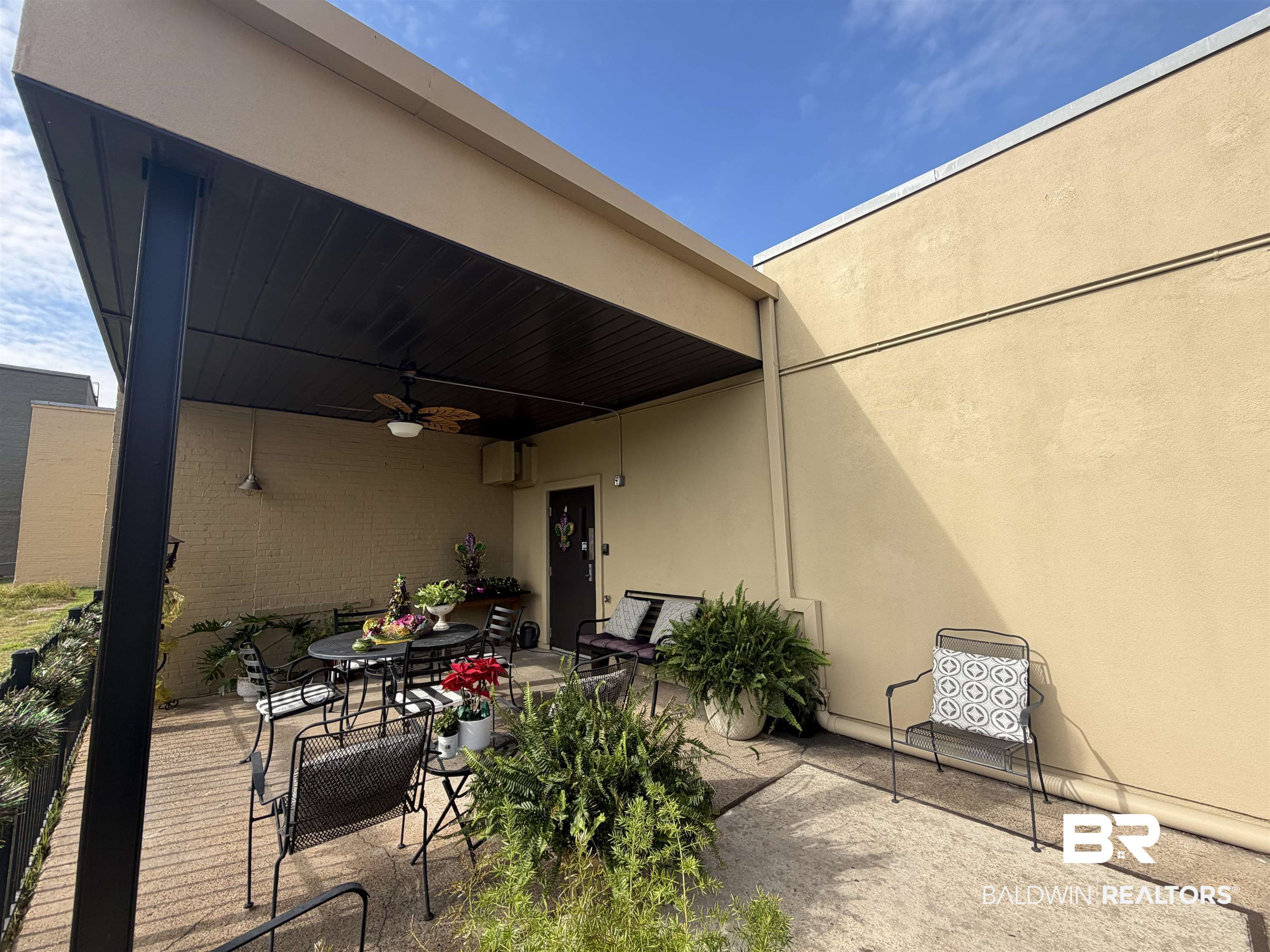 308 St Louis Street, Unit 101 Mobile, AL 36602 - Photo 30 of 30 View of patio with a ceiling fan and outdoor dining area