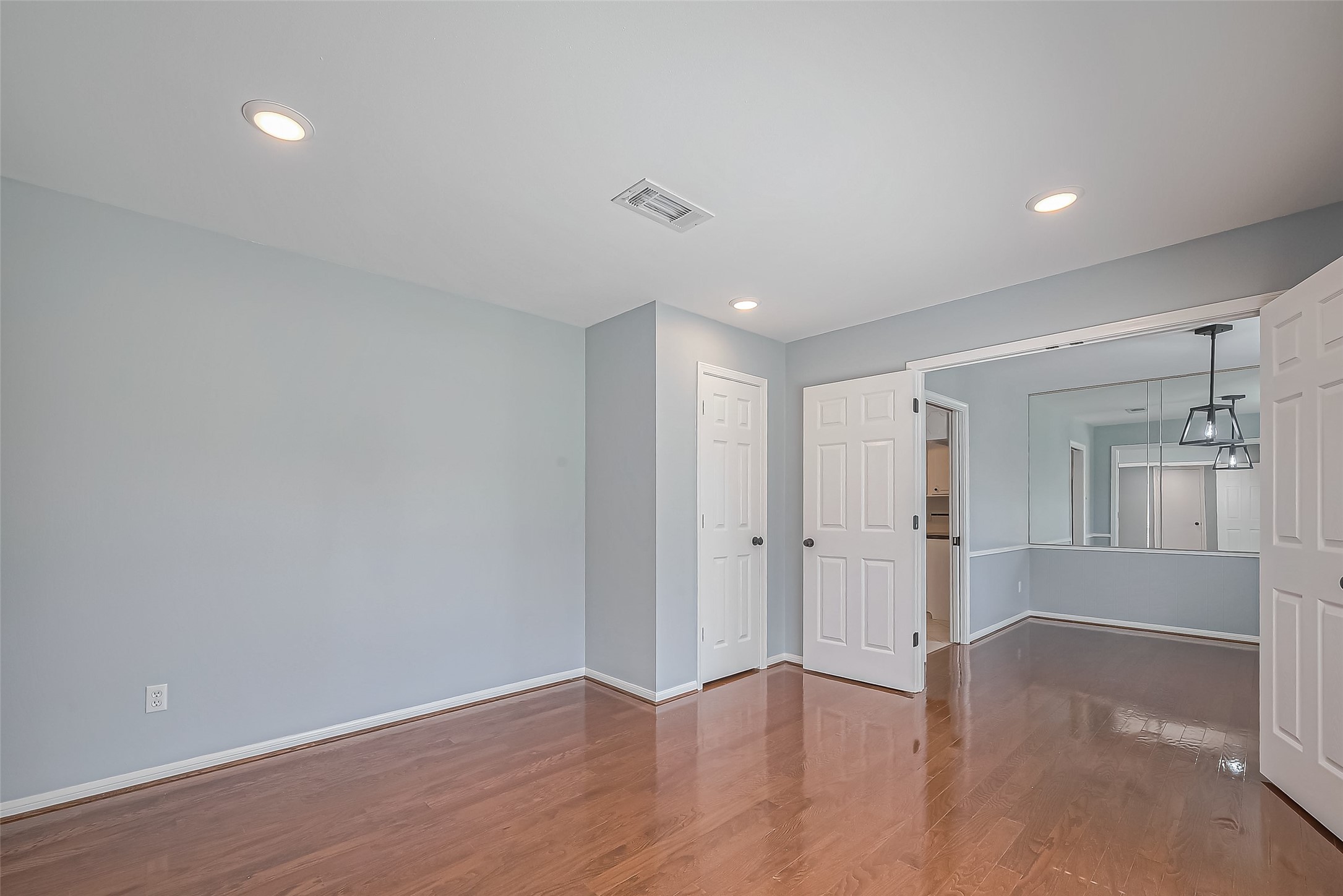 16506 Amcreek Road Houston, TX 77068 - Photo 17 of 50 wooden floor in an empty room with a window