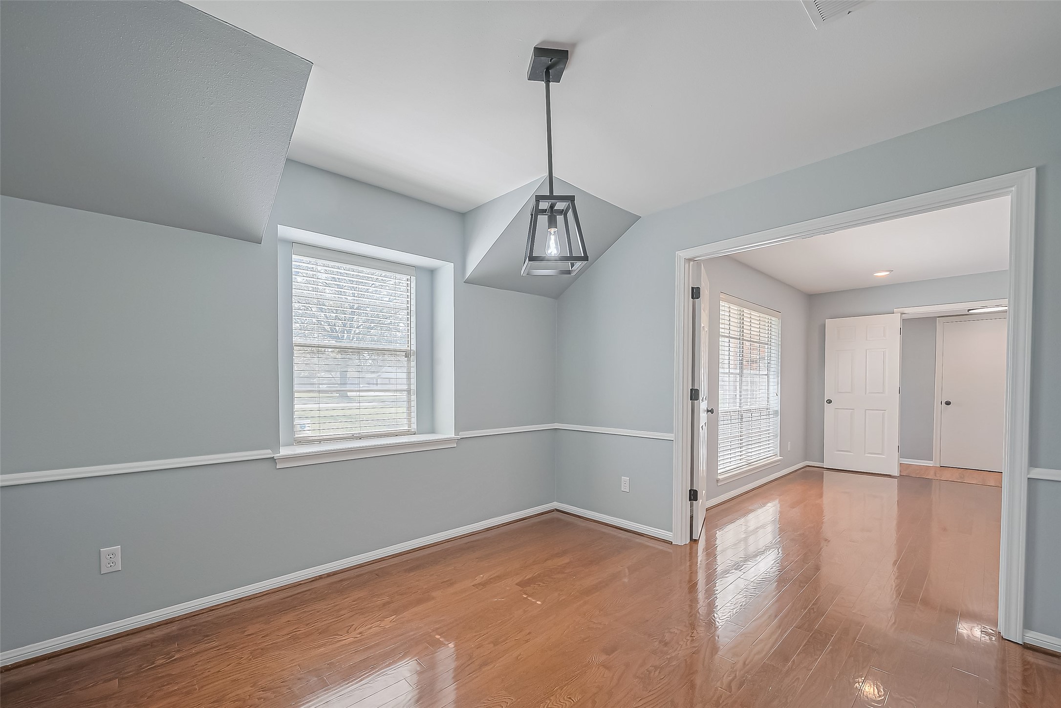 16506 Amcreek Road Houston, TX 77068 - Photo 21 of 50 a view of a room with window and wooden floor