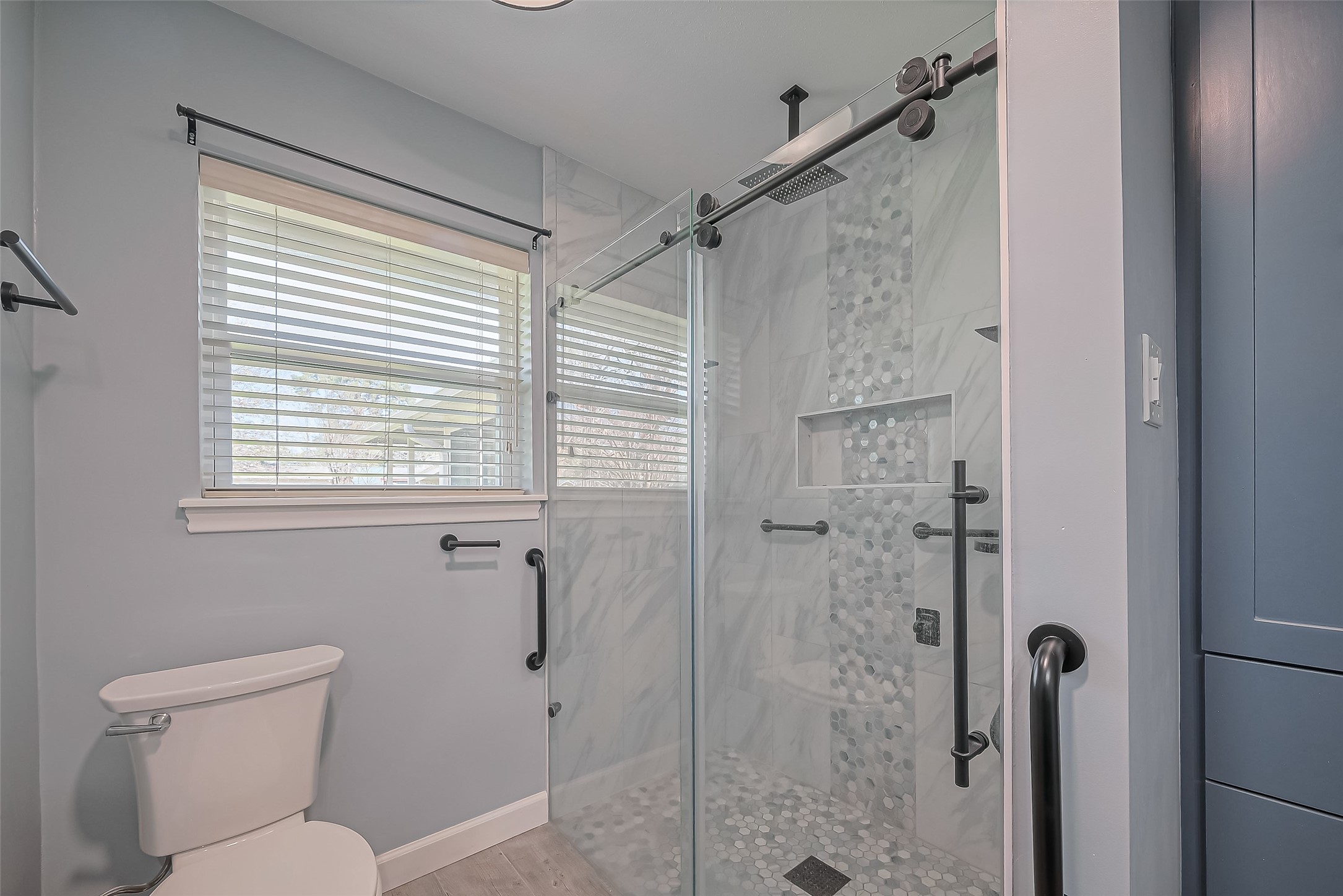 16506 Amcreek Road Houston, TX 77068 - Photo 26 of 50 a bathroom with a shower and a toilet