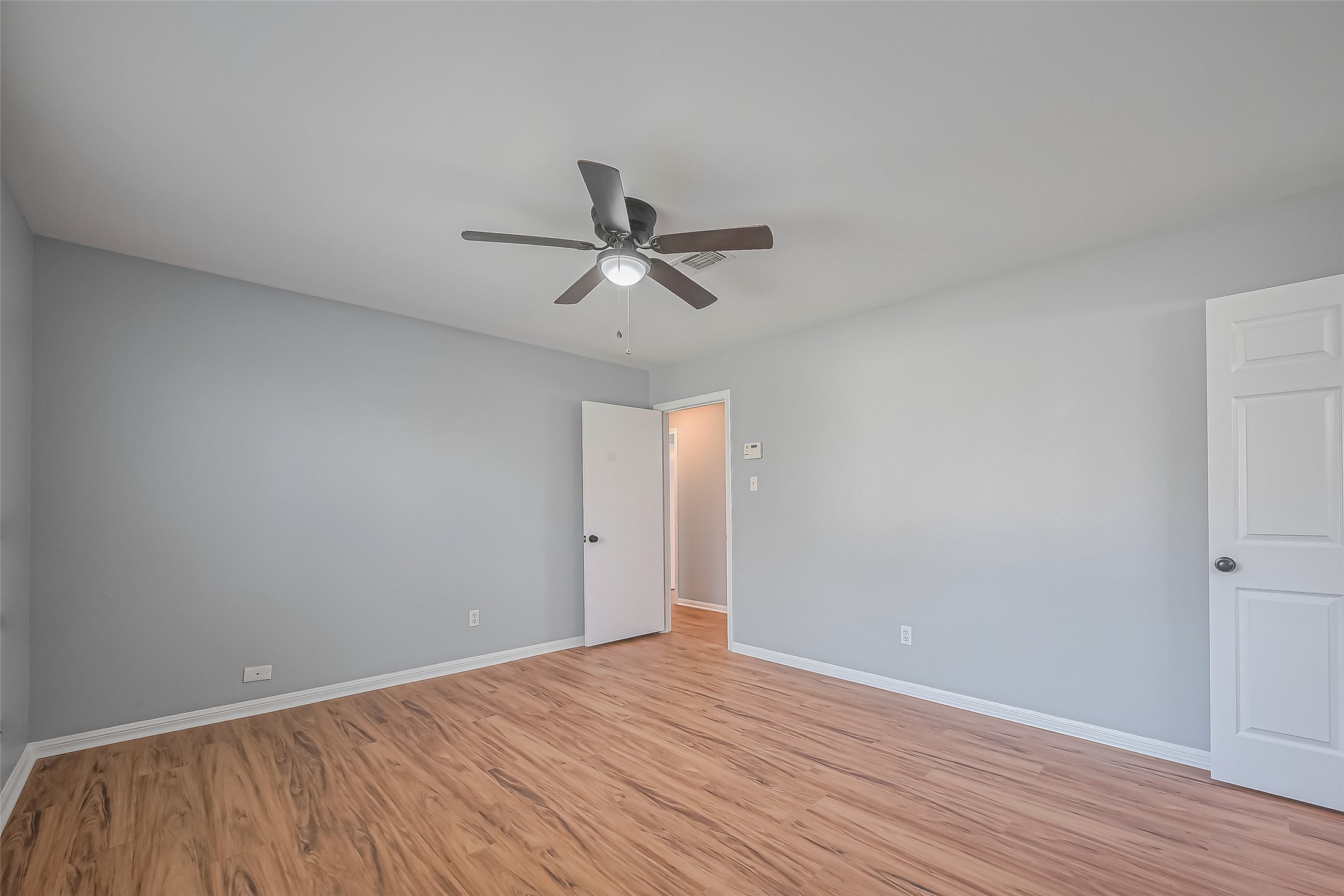 16506 Amcreek Road Houston, TX 77068 - Photo 33 of 50 wooden floor in an empty room