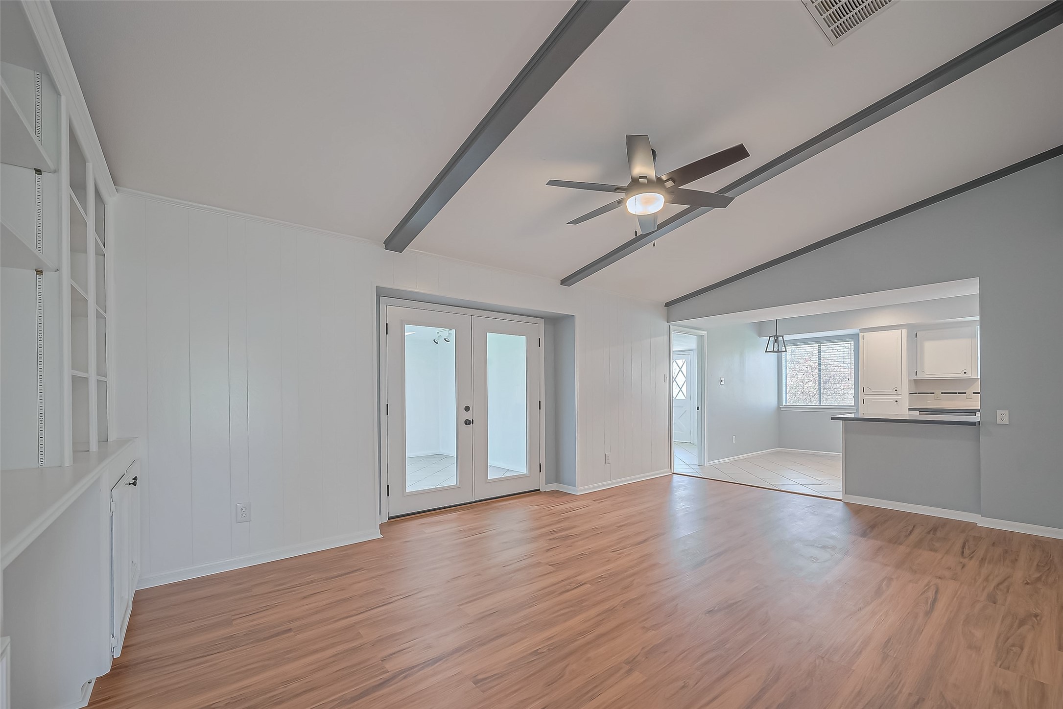 16506 Amcreek Road Houston, TX 77068 - Photo 8 of 50 wooden floor in an empty room with a window