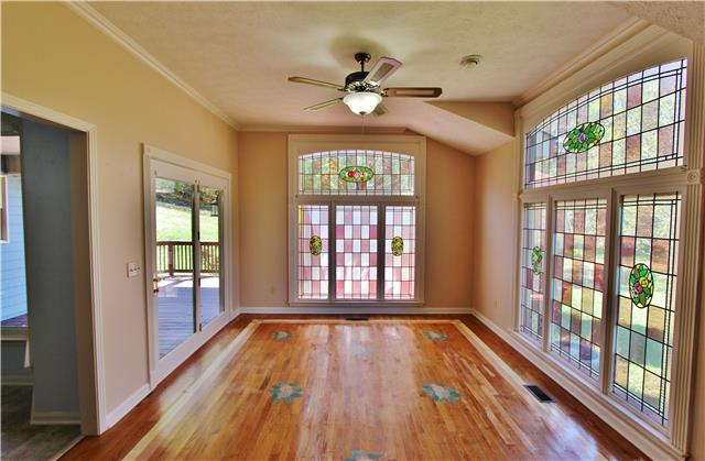 406 Cambridge Road Lebanon, TN 37087 - Photo 11 of 20 Florida room with floor to ceiling stain glass windows