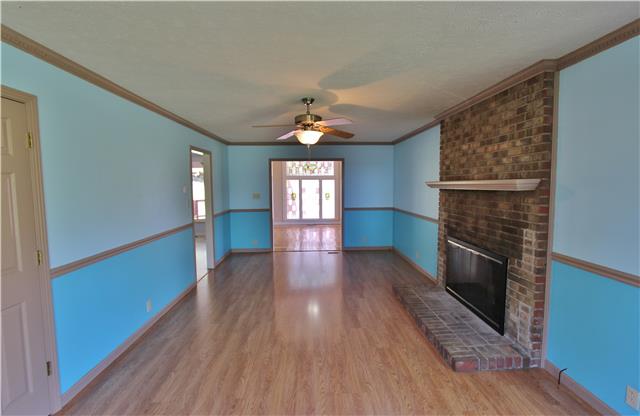 406 Cambridge Road Lebanon, TN 37087 - Photo 12 of 20 Living room with fireplace measures 23x11