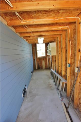 406 Cambridge Road Lebanon, TN 37087 - Photo 3 of 20 Additional 20'x6' enclosed storage space for tools. Does have electricity