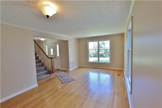 406 Cambridge Road Lebanon, TN 37087 - Photo 4 of 20 Den has original hardwoods. Could be used a dining room.