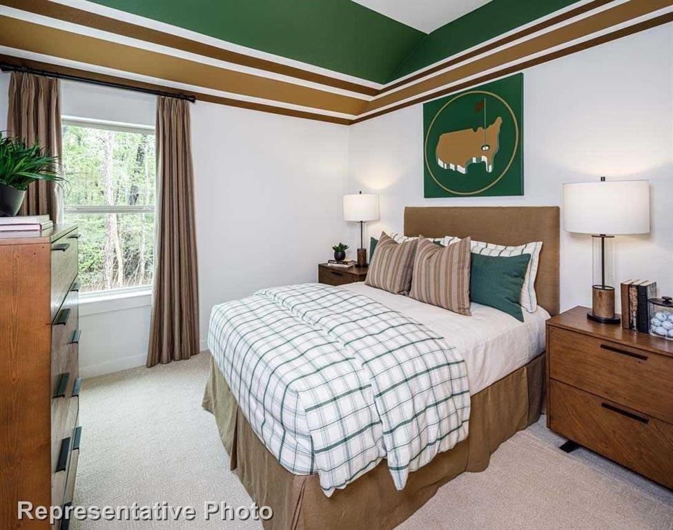 1138 Morgan Drive Sherman, TX 75090 - Photo 4 of 21 a bedroom with a bed and a night stand