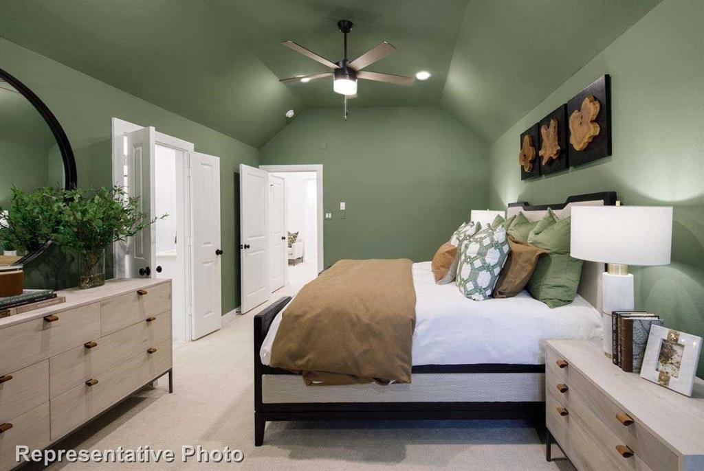 1138 Morgan Drive Sherman, TX 75090 - Photo 7 of 21 a bedroom with a bed and a potted plant on dresser