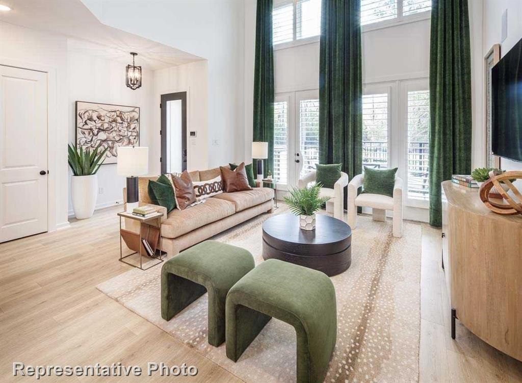 1138 Morgan Drive Sherman, TX 75090 - Photo 10 of 21 a living room with furniture and a large window