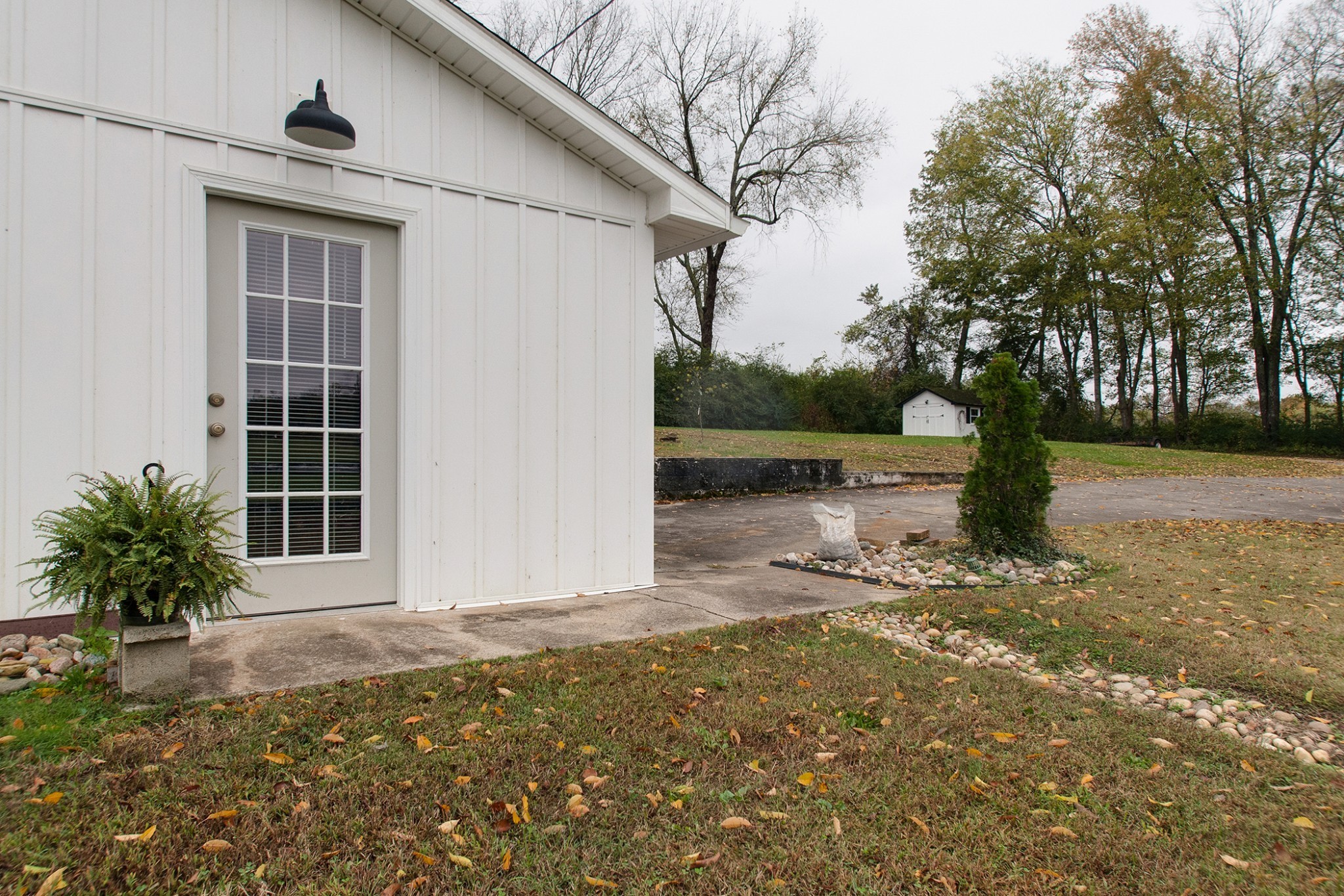 0 Cedar Hill Road Kingston Springs, TN 37082 - Photo 13 of 17 a front view of a house with garden