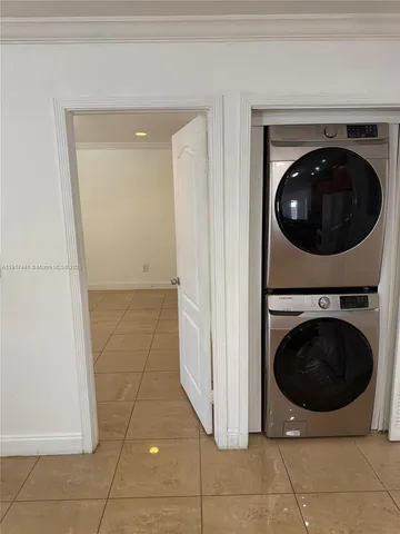 a view of an empty room with a sink
