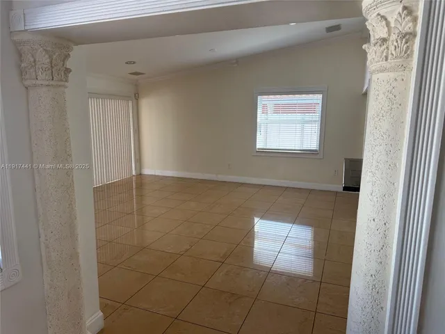 an empty room with windows