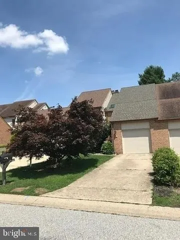 front view of house with a yard