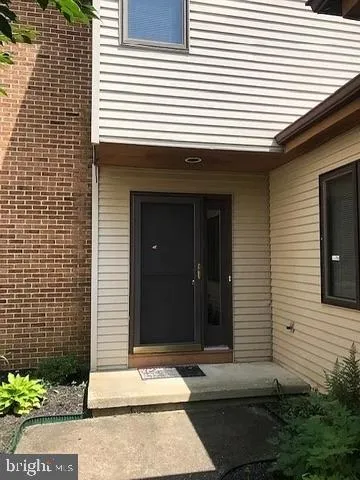 a front view of a house with a garage