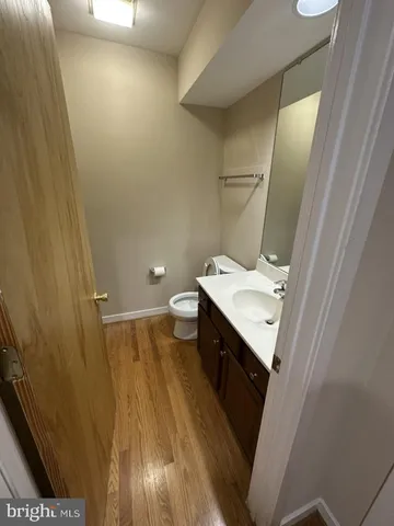 a view of swimming pool with a garden and trees