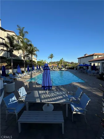 a view of a chairs and table on the terrace