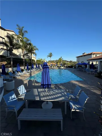 a view of a chairs and table on the terrace