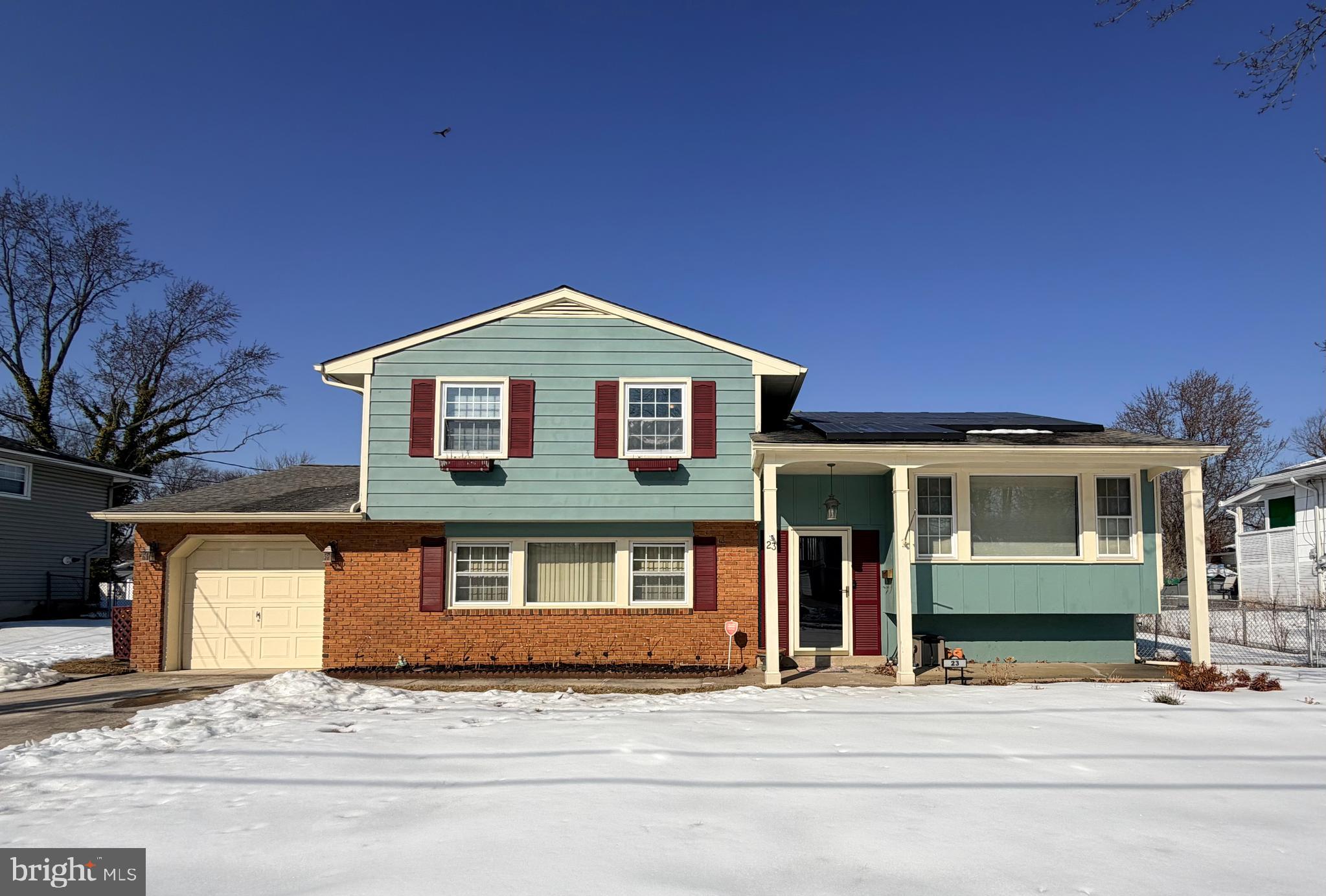 23 Lehigh Drive Delran, NJ 08075 - Photo 1 of 22 a front view of a house with a garage