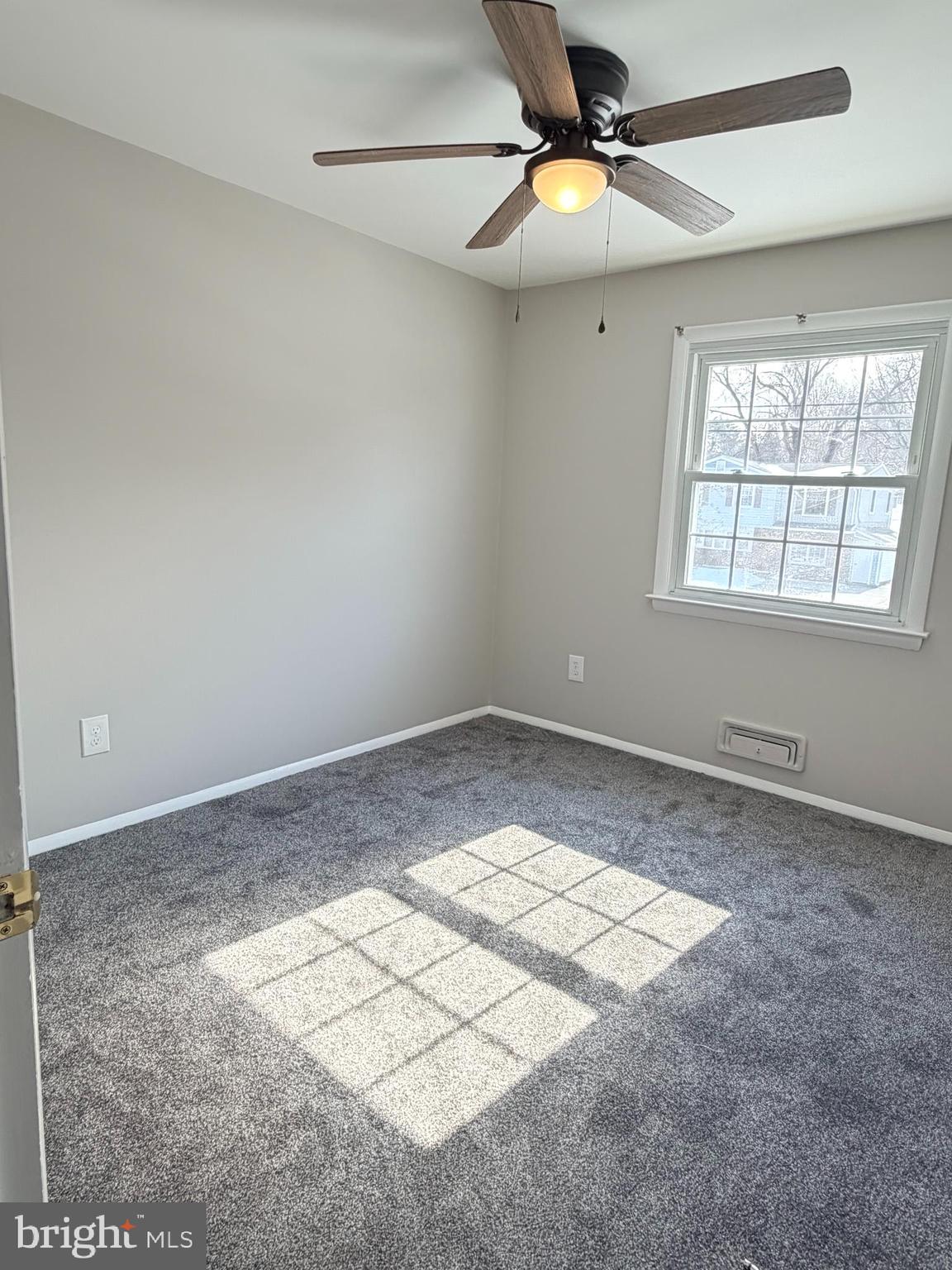 23 Lehigh Drive Delran, NJ 08075 - Photo 17 of 22 a view of an empty room and window