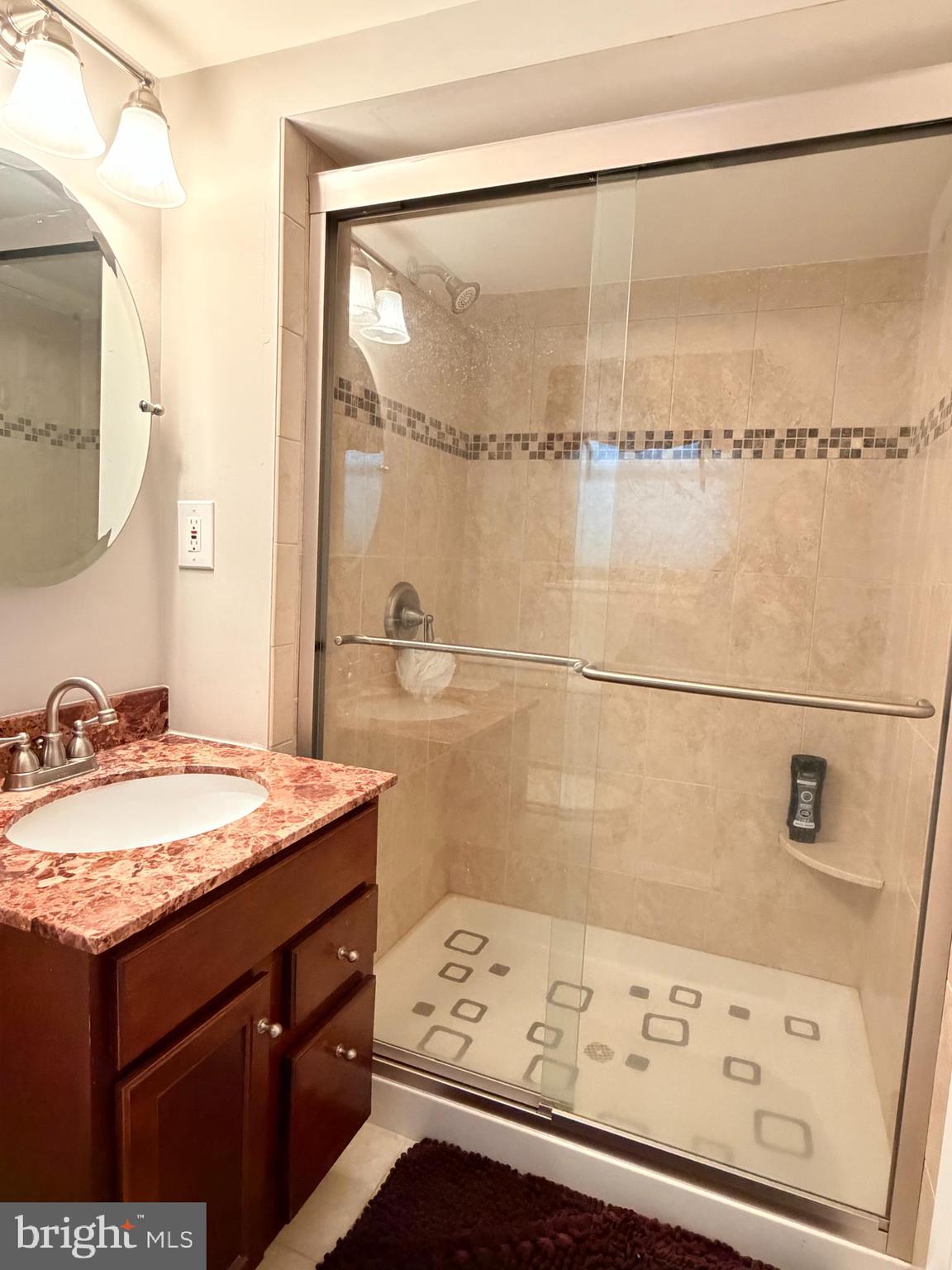 23 Lehigh Drive Delran, NJ 08075 - Photo 18 of 22 a bathroom with a sink and a mirror