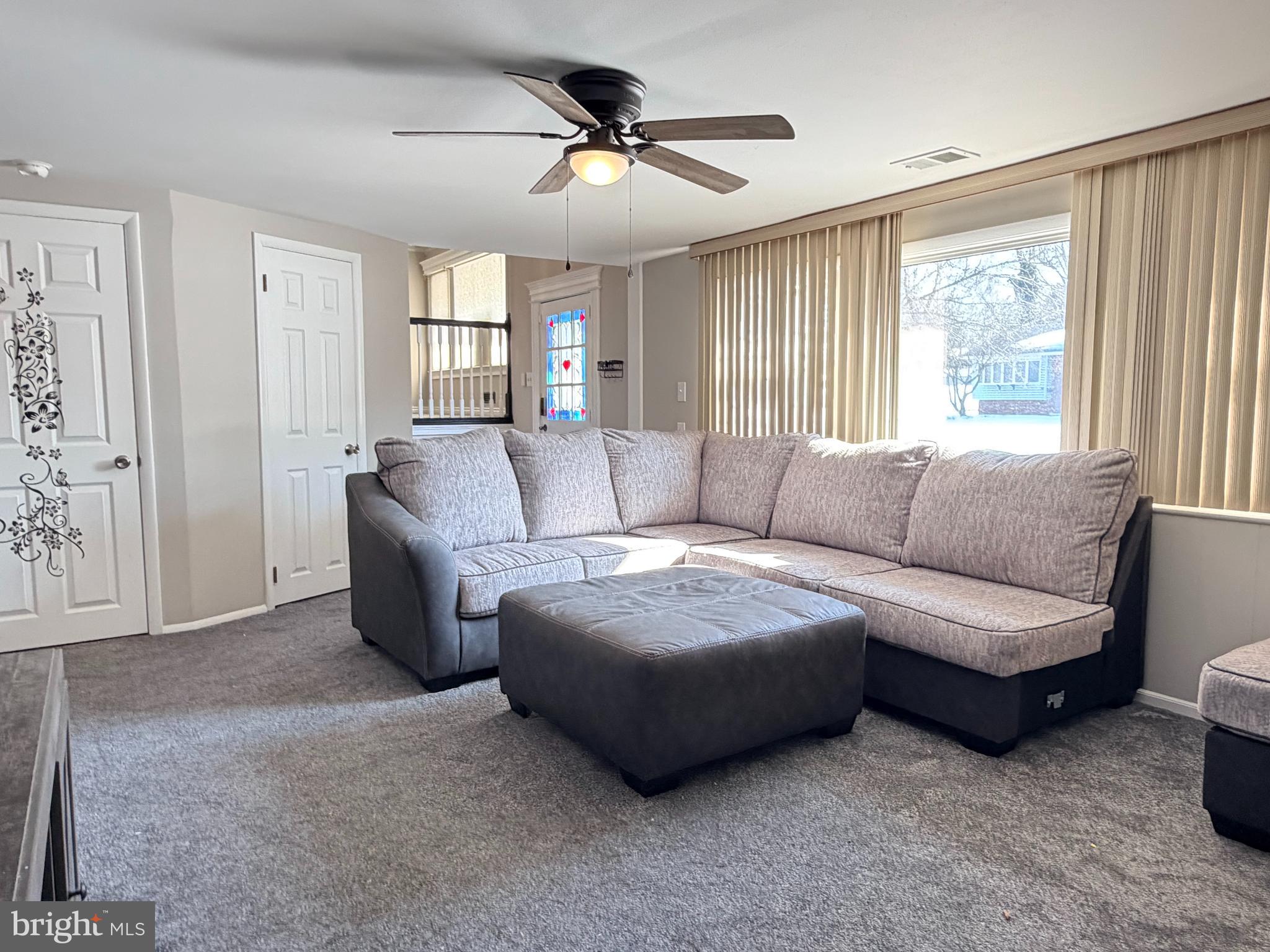23 Lehigh Drive Delran, NJ 08075 - Photo 2 of 22 a living room with furniture and a window