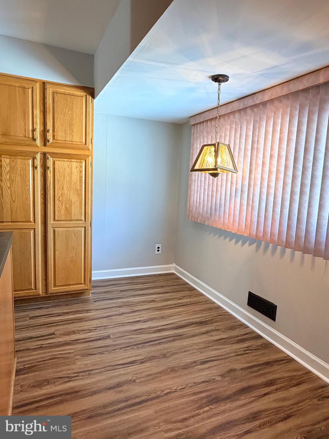 23 Lehigh Drive Delran, NJ 08075 - Photo 8 of 22 a view of an empty room with a window and wooden floor